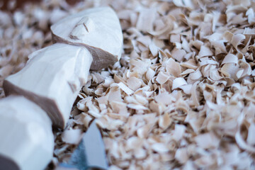 wood carving shavings and a cutter