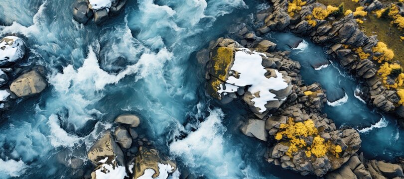 In this wide-format background image for creative content, an aerial view capturing ice-melting water streams rushing through rocks. Photorealistic illustration