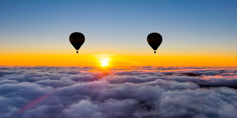 hot air balloon flying in the sunset
