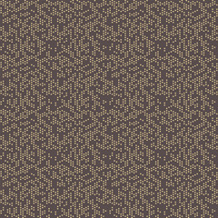 Seamless vector brown and yellow background with random dots. Abstract ornament. Seamles abstract pattern