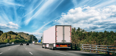 Truck Or Traction Unit In Motion On Road, Freeway. Asphalt Motorway Highway Against Background Of...