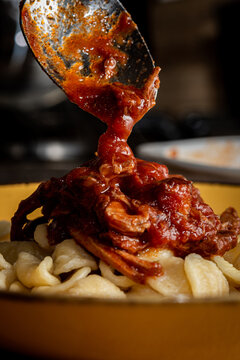 Serving Neapolitan Rag&ugrave; On Pasta