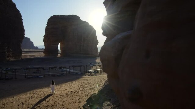 Woman Walking Towards Elephant Rock - Wide, Cinematic Shot