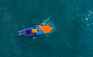 View of the surfer from above. Photo from a drone.
