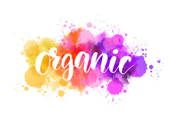 Organic - handwritten modern calligraphy lettering on abstract multicolored watercolor splash background