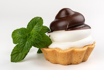 Chocolate cake (tart, cucake) with cream and chocolate