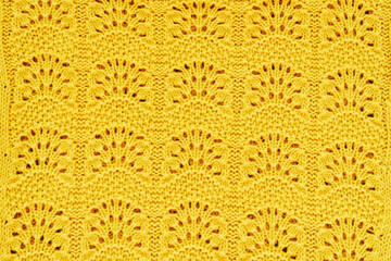 Yellow knitted fabric texture, background
