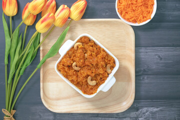 Gajar ka halwa is a carrot-based sweet dessert pudding from India. Garnished with Cashew/almond nuts.Gajar halwa, also known as gajorer halua, gajrela, gajar pak, and carrot halwa.
