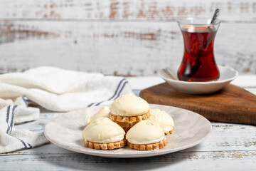 Chocolate cookie. Delicious cookies with white chocolate and cream on a plate