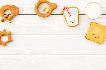Funny cookies in shape of milk in glass and biscuit with kids toys