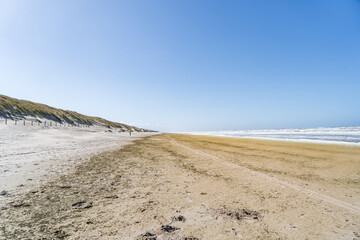 endless sand beaches at north sea in the netherlands