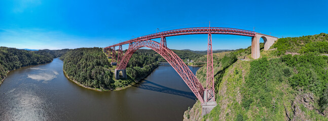 Aerial view of Garabit viaduct over the Truyère river in France - obrazy, fototapety, plakaty