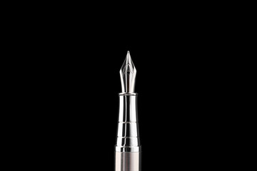Stylish silver fountain pen on black background
