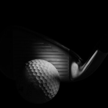 Moody Golf Concept on a Black Background showing Iron Club Face and Ball