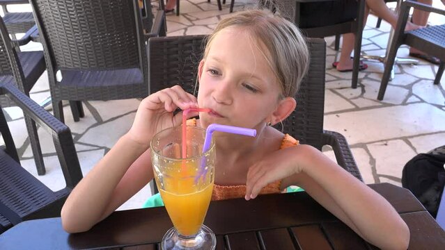 Child Drinking Orange Juice at Restaurant, Kid Portrait at Bar, Girl at Terrace