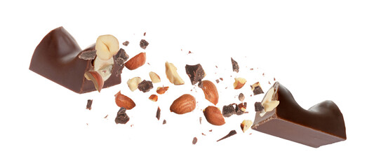 Broken chocolate bar with nuts in air on white background