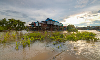 Fototapeta na wymiar Exotic Kampong Phluk floating village with stilt houses -Tonle Sap lake, Siem Reap Province, Cambodia