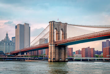 View of the Brooklyn bridge and the Manhattan skyline, in New York. Photo taken from the ferry,...