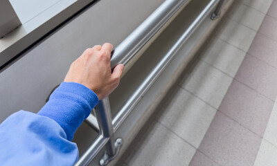 handrail offers security and guidance, symbolizing safety and support in everyday life, depicted in a clean and modern setting