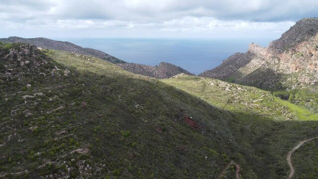 Scenic drone footage of the Coll de Sa Gramola, Mallorca. Fascinating aerial views of landscape, mountains, rocks and seaside.