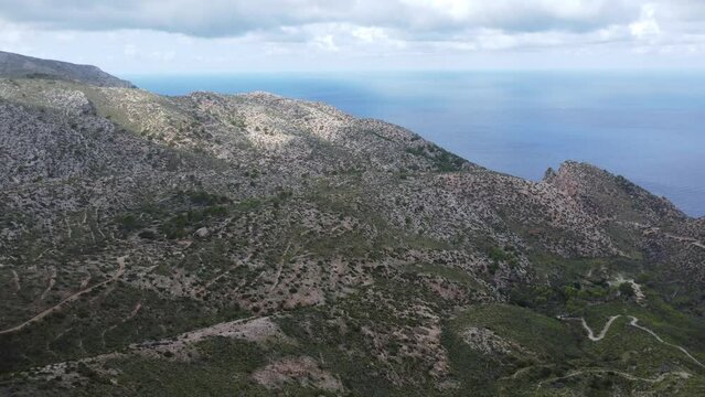 Scenic drone footage of the Coll de Sa Gramola, Mallorca. Fascinating aerial views of landscape, mountains, rocks and seaside.
