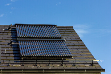 solar water collectors on rooftop © rudolfgeiger