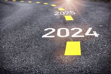 Year 2024 to 2026 written on the road. Business planning concept and new year beginning success idea