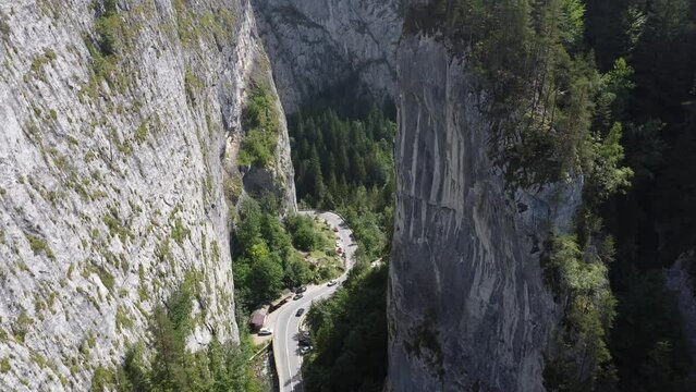 Scenic drone footage of Cheile Bicazului, Romania. Fascinating aerial views of landscape, mountains, rock and road.