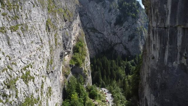 Scenic drone footage of Cheile Bicazului, Romania. Fascinating aerial views of landscape, mountains, rock and road.