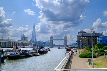 River Thames view from Waterside Gardens, London, with the Tower Bridge and the Shard building in...