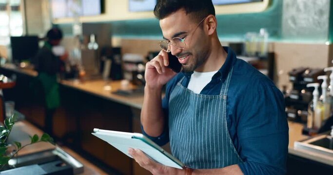 Man, phone call and tablet for restaurant communication, online management or customer service in cafe. Small business owner, waiter or barista on mobile and digital inventory for coffee shop startup