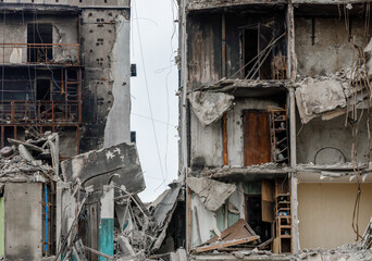 destroyed and burned houses in the city during the war in Ukraine