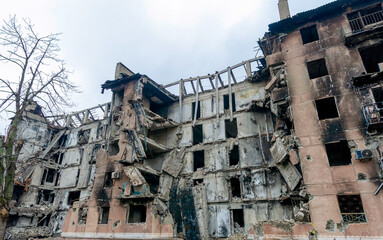 Fototapeta premium destroyed and burned houses in the city Russia Ukraine war