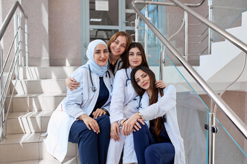 Group of students on the stairs in the corridor of a medical university
