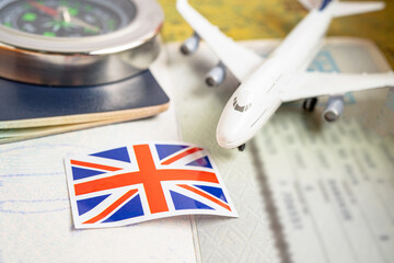 Approved Stamp visa and passport with United Kingdom flag document to immigration at airport in...