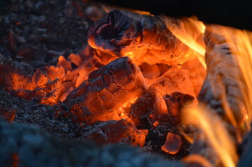 Closeup of burning wood and charcoals