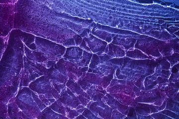 Liquid pastel purple with glitter shimmer wives gel cosmetic smudge background