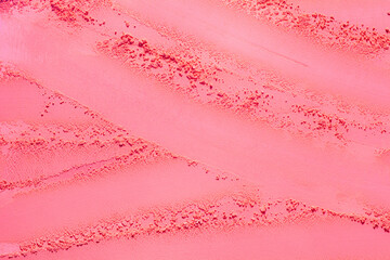 Blusher or pink peach eye shadow swatch smudge textured background