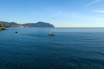 Sail boat in the sea at the coast of Italy
