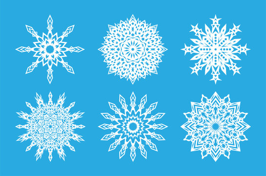 Vector illustration. Beautiful set of white snowflakes on a blue background for winter design. Collection of Christmas and New Year elements. Frozen silhouettes of crystal snowflakes.