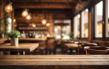 Foto op Canvas Empty wooden table with blur rustic bar restaurant cafe background © Nisit