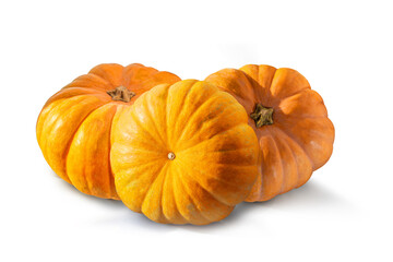 Ripe fresh pumpkin on a white isolated background. Squash orange vegetable autumn fruit for food health benefits, or traditional Halloween decoration or a Thanksgiving fall design