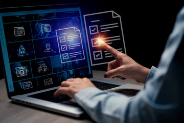 Businessman using laptop doing online checklist survey,Business performance checklist,online...