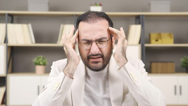 Man with headache.
