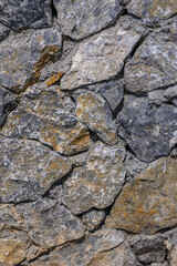 old natural stone wall as background 