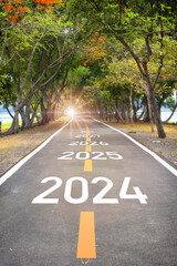 2024 to 2028 on asphalt road surface. Beginning business startup to success concept and recovery challenge investment idea - obrazy, fototapety, plakaty