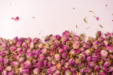 Dry tea roses isolated on white background.