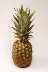 Fototapeta premium Pineapple isolated on white. Top view.