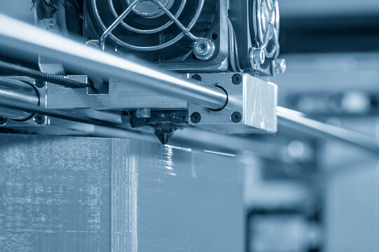 Close up scene the additive manufacturing by 3D printer machine.