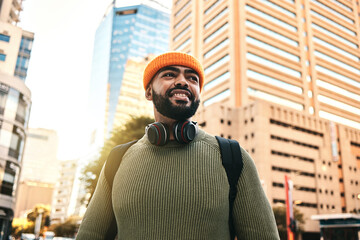 City, smile and black man travel, walking and happy on morning trip, outdoor journey and commute in Los Angeles. Happiness, urban town and African commuter, pedestrian or person in California, USA